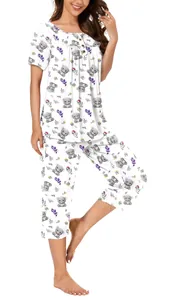 Two-piece women's pajama set featuring cute cartoon koala print and buttoned round neck