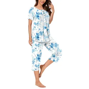 Elegant women's two-piece floral pajama set with short sleeves and cropped pants