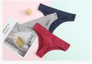 Seamless low waist thongs displayed with elegant lifestyle props in a detailed view