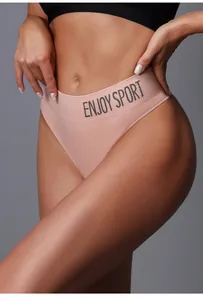 Detail of pink seamless sports thong with ENJOY SPORT lettering on waistband