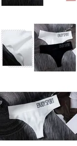 Detail showing seamless sports thong with Enjoy Sport waistband on soft grey background.