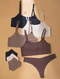 Collection of seamless wireless bras and matching thongs in assorted neutral earth tones