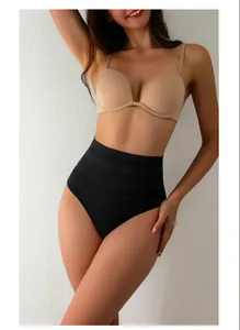 Detail shot of high waist tummy control shapewear panties on a professional model.