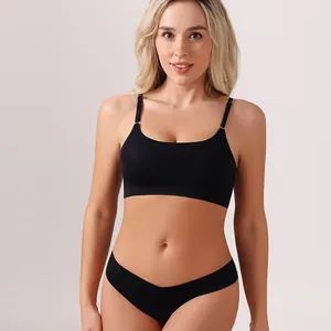 Seamless black bra and panty set for women featuring breathable fabric and thin straps.