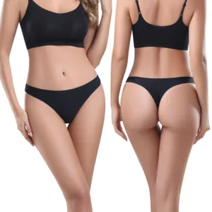 Professional studio shot of black seamless ice silk low waist thong and bra set on female model