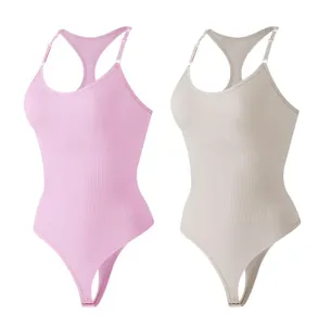 Details of pink and beige seamless shapewear bodysuits with thong snap closure