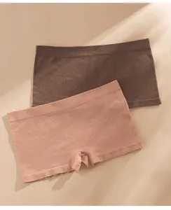 Detailed view of ribbed texture on seamless pink and brown women's boxer panties