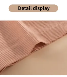 Macro view of breathable ribbed fabric on women's seamless fitness boxer shorts