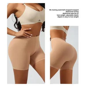 Front and back view of beige seamless tummy control shaping shorts with high waist design