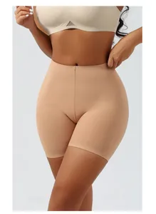 Detail view showing the texture of seamless mid-waist shapewear shorts for tummy control.