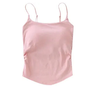 Slim fit pink ruched camisole with spaghetti straps and built-in bra padding