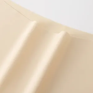 Close-up of beige seamless ice silk high waist panties showing smooth fabric texture