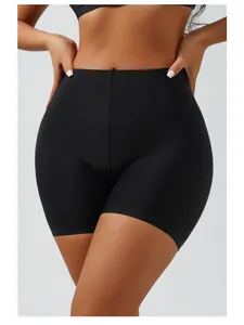 Detailed view of black seamless high-waisted shapewear shorts for tummy control and lifting