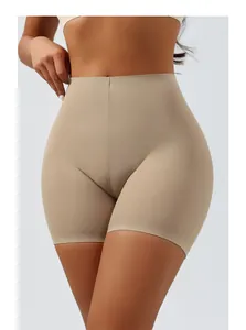 Seamless high-waisted tummy control shapewear shorts in nude tone for body sculpting