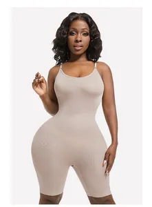 Detail of seamless beige shapewear bodysuit for tummy control and body shaping.