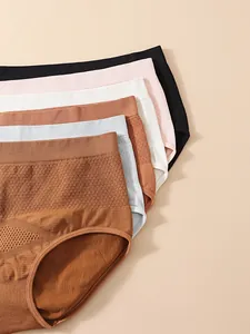 Detail of seamless high-waist panties with 3D honeycomb texture in various colors.