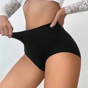 High-waisted 3D honeycomb seamless tummy control briefs for women in solid black