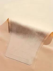 Macro detail of the high-stretch seamless ribbed fabric on breathable nude yoga panties