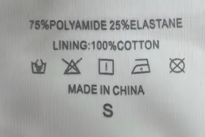 Close-up of 75% Polyamide 25% Elastane fabric and cotton lining label on seamless briefs