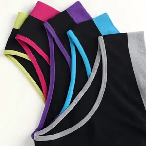 Set of seamless low-rise women's panties with vibrant contrast color edges on white background