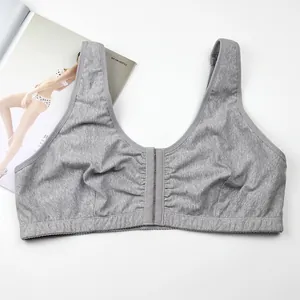 Close-up of a grey cotton wireless plus-size bra with front hook-and-eye closure