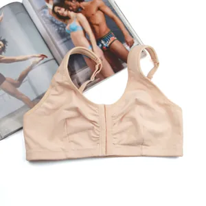High-quality close-up of a beige plus size cotton wire-free bra with front hook closure design