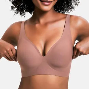 Close-up detail of a women's seamless wire-free push up bra in a nude brown color
