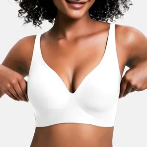 Close-up detail showing the seamless fit of a white wireless push-up bra on a model