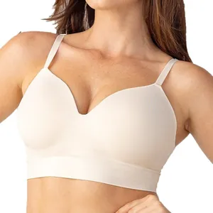 Comfortabele beige push-up beha zonder beugel voor dames met naadloos design.