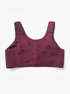Detailed view of a burgundy wireless bra with decorative cross-stitching on the front