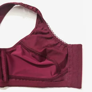 Detailed close-up of breathable mesh lining in wine red wireless bra for comfort.