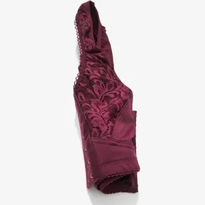 Detail of burgundy lace bra showing front hook-and-eye closure and intricate floral patterns