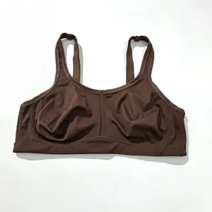Close-up of chocolate brown plus size wire-free sports bra with mesh detail
