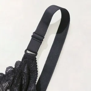 Close-up of adjustable strap on a black floral lace plus size bra for a comfortable fit