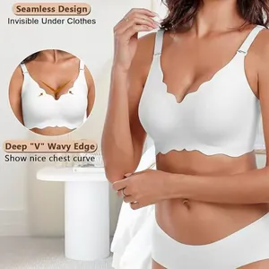 Detail view of white seamless bra featuring elegant wavy edges and deep V design