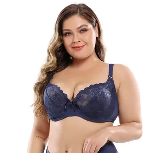 Detailed view of a navy blue plus size lace bra with intricate floral patterns