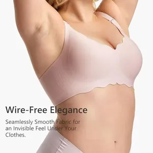 Close-up of seamless pink bra with wavy edges and wire-free support for comfort.