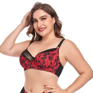 Close-up view of a sexy red floral lace bra for full-figure women on a model