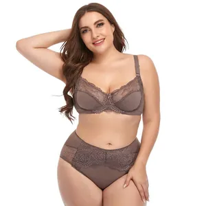 Full shot of model wearing plus size underwired lace bra and matching panty set