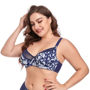 Detailed view of the elegant navy blue floral print bra featuring delicate lace accents.