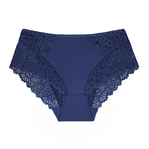 Close-up view of dark blue high-waisted floral lace panties with cotton crotch