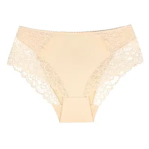Detailed view of high-waisted beige lace panties featuring intricate floral embroidery
