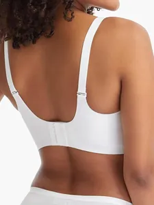 Detailed back view of a seamless white wireless bra showing adjustable straps and soft support