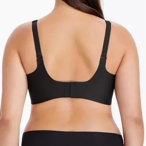 Rear view of black seamless wireless plus size bra on model