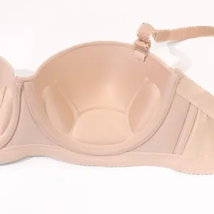 Close-up detail of the palm-rest interior padding in a seamless nude strapless bra