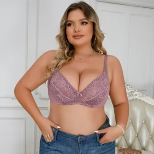 Detailed view of elegant pink floral lace on a plus size underwired push-up bra