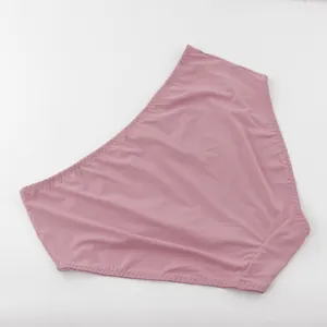 Detail of mauve plus size high-waisted women's lace trim panties on white background