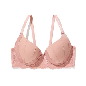 Elegant dusty rose push-up bra with delicate floral lace trim and center bow detail.