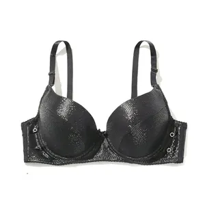 Close-up detail of a sexy black PU leather push-up bra featuring a unique shiny texture.