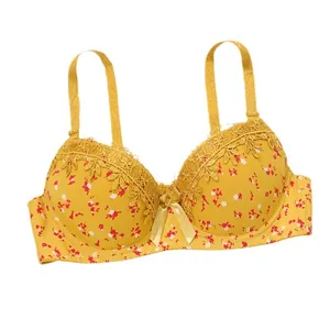 Sujetador push-up amarillo con estampado floral, bordado de encaje y detalle de lazo